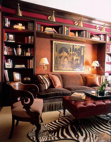 καλαίσθητο σπιτικό βιβλιοθήκη καναπές ζέβρα μοτίβο χαλί