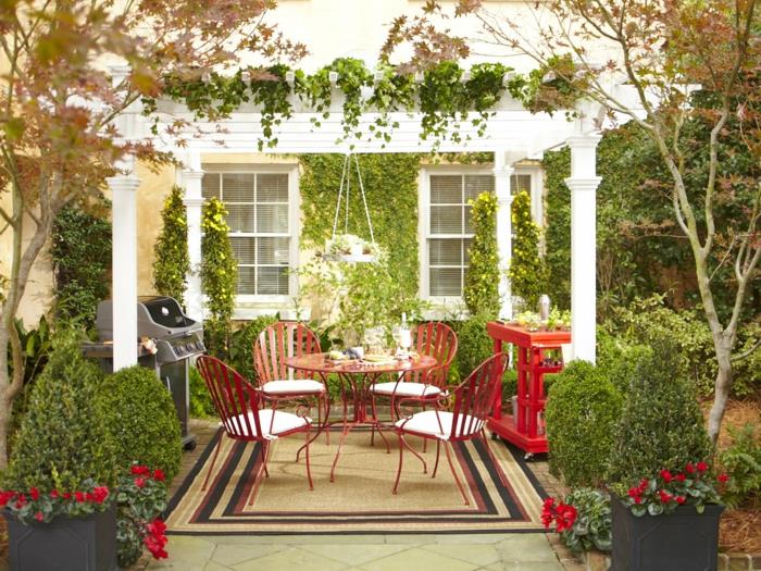 χαλαρώστε ιδέες σχεδιασμού κήπου χρωματιστό φυτό στρογγυλό τραπέζι κήπου