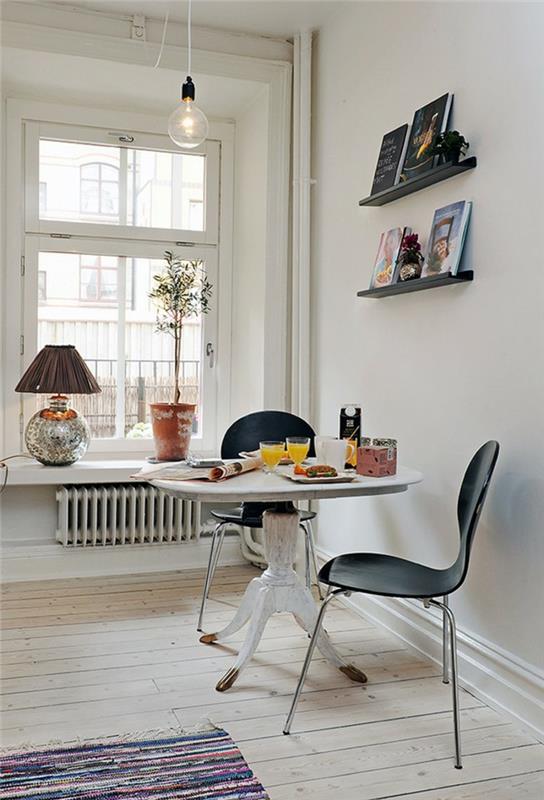 τραπεζαρία φανταχτερό τραπέζι φαγητού μαύρες καρέκλες χρωματιστό χαλί