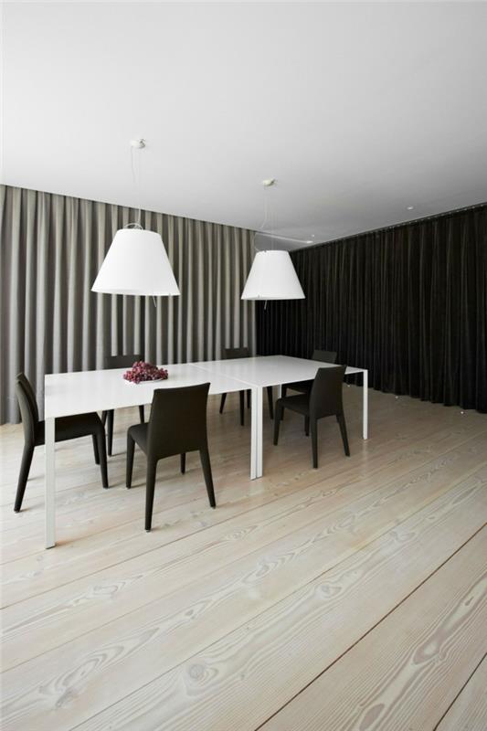 Τραπεζαρία με λευκή τραπεζαρία με μαύρες καρέκλες ξύλινο πάτωμα