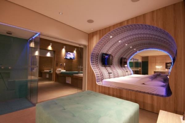 φουτουριστικό υπνοδωμάτιο σχεδιάζει σε σχήμα κελύφους με φως νέον