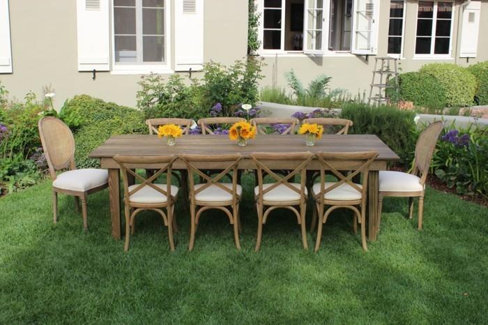 ιδέες σχεδιασμού κήπου μακρύ τραπέζι κήπου και πολλές καρέκλες κήπου