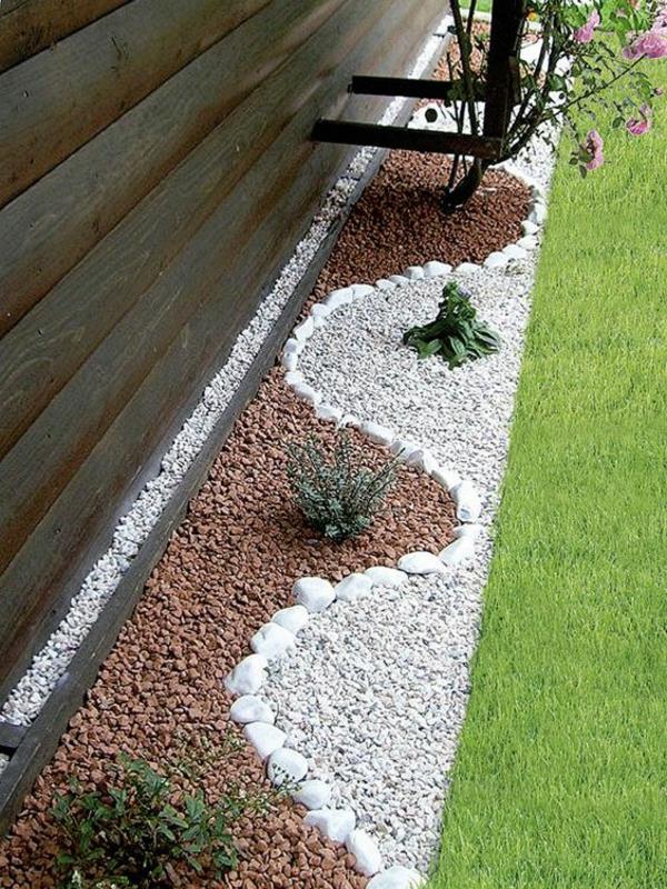 ιδέες κήπου ying yang χαλίκι σχεδιασμός κήπου πράσινο γρασίδι στρογγυλές πέτρες
