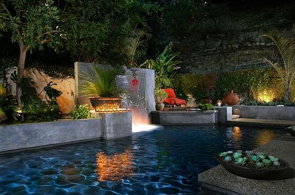 κήπος με σχεδιασμό πισίνας πολυτελής εξοχική κατοικία τη νύχτα με φωτισμό κήπου