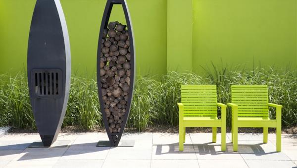 κήπος μοντέρνες εικόνες πράσινες καρέκλες καυσόξυλα τζάκι μοντέρνες ιδέες σχεδιασμού κήπου