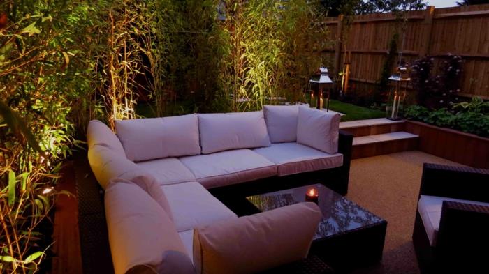 ιδέες σχεδιασμού κήπου φωτισμός κήπου άνετα φυτά καναπέ