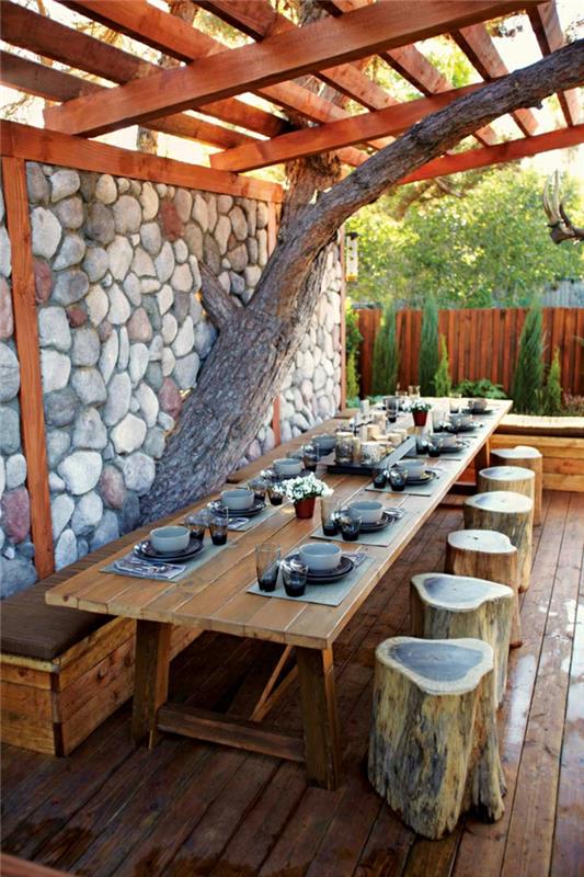 τραπέζι κήπου ρουστίκ ιδέες σχεδιασμός κήπου ξύλινα έπιπλα κήπου δέντρα κούτσουρα σκαμπό