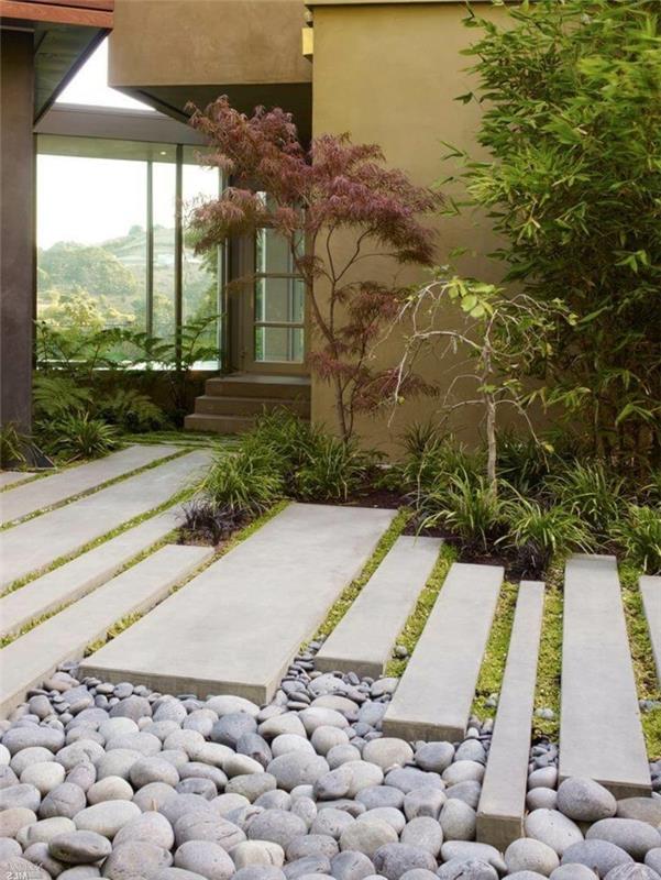 ιδέες σχεδιασμού κήπου όμορφο μονοπάτι κήπου με πέτρες και γρασίδι
