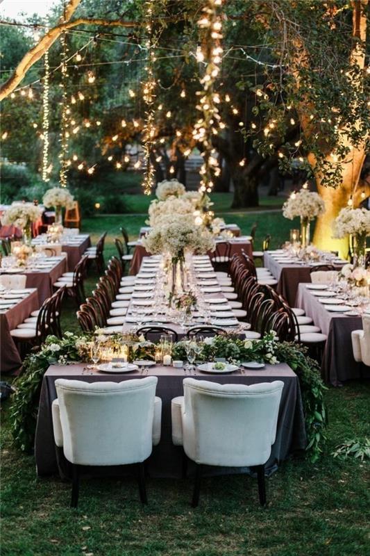 πάρτι στον κήπο στολίζουν γαμήλιο πάρτι με φώτα νεράιδας