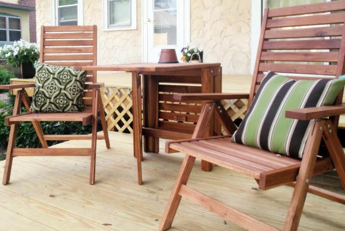 τραπέζι κήπου ξύλο λειτουργικό σχέδιο ρίξτε μαξιλάρια