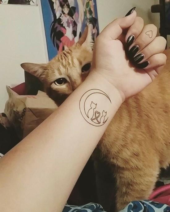 ημισέληνος καρπός τατουάζ γάτας