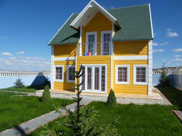 προσόψεις σπιτιού χρώματα κίτρινο χρώμα σχεδιαστικές ιδέες καλοκαιρινή κατοικία