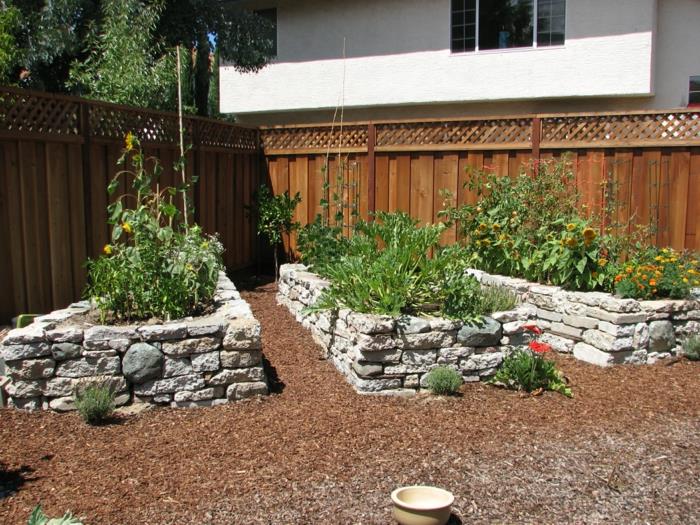 υπερυψωμένα κρεβάτια πέτρινο σχέδιο κήπο φυτά φράχτη κήπου