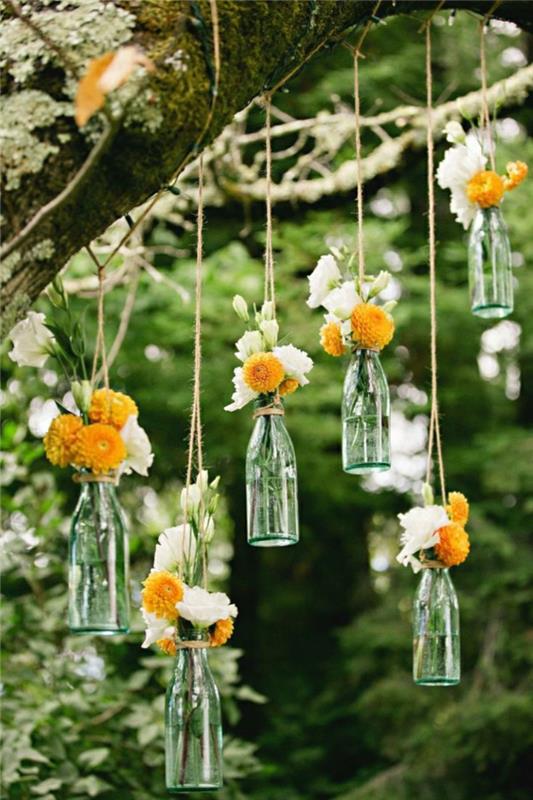 τάσεις διακόσμησης γάμου λουλούδια κρεμαστά γυάλινα μπουκάλια