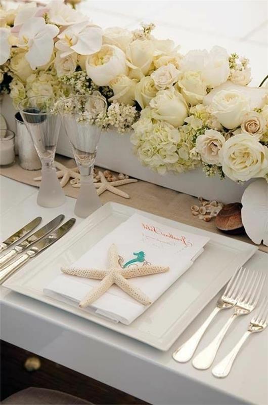 γαμήλια διακόσμηση τραπέζια λευκά τριαντάφυλλα αστερίας