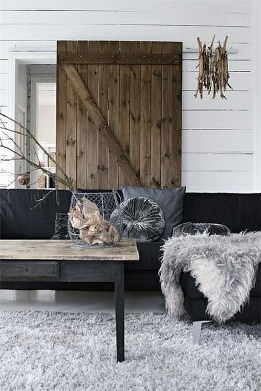ξύλινα δοκάρια σαλόνι ρουστίκ έπιπλα σαλονιού γούνα χαλί ξύλινη πόρτα