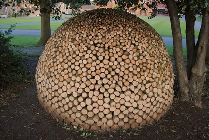 ξύλινα γλυπτά κάνουν ξύλινα μπλοκ να χτίζουν μια μπάλα