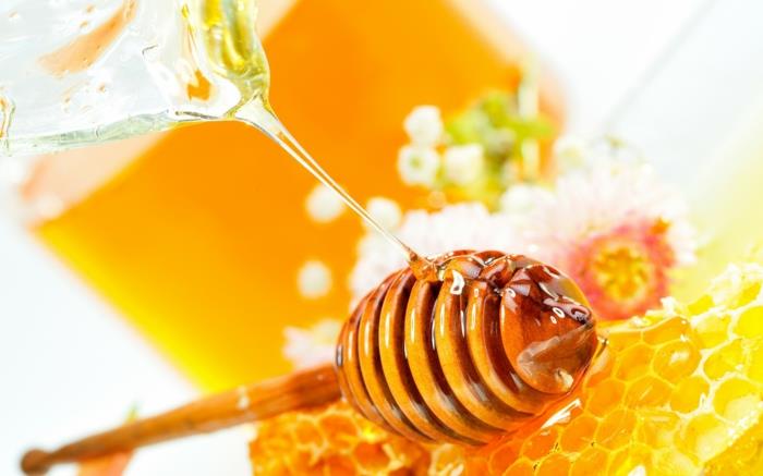 μέλι στο κεφάλι υγιές δοχείο μελιού κουτάλι μέλι χρυσή αξία μέλι κουτάλι μέλι βάζο