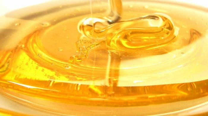 μέλι υγιεινό δοχείο μελιού κουτάλι μέλι χρυσή αξία