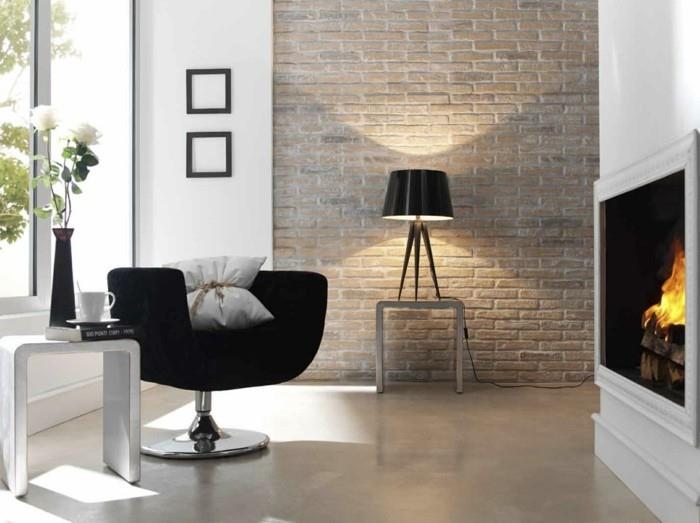 ιδέες για σχεδιασμό τοίχου ζωντανές ιδέες σαλόνι τζάκι μαύρη πολυθρόνα τοίχος από τούβλα
