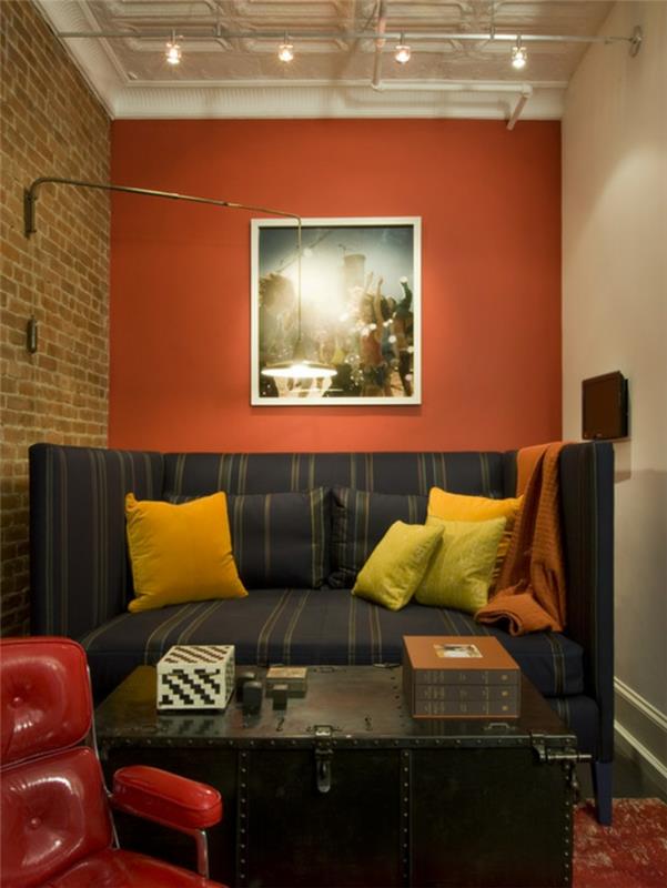 εσωτερική διακόσμηση ιδέες καθιστικού σαλόνι καναπές πέτρινος τοίχος χρωματιστές πινελιές