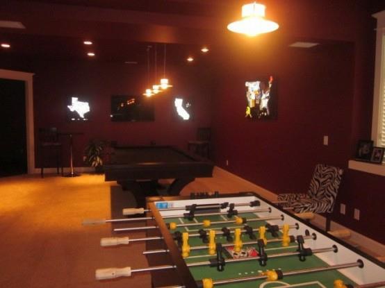 εσωτερικές ιδέες σχεδιασμού σπιτιού αίθουσα παιχνιδιών στήσιμο τραπέζι μπιλιάρδου ποδοσφαίρου