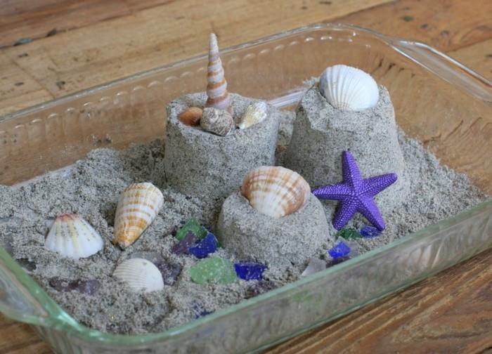 κινητική άμμος στο ταψί με μύδια και σαλιγκάρια