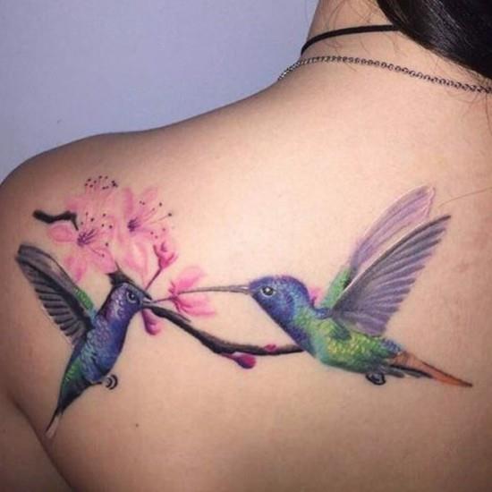 τατουάζ άνθη κερασιάς με κολιμπρί πίσω