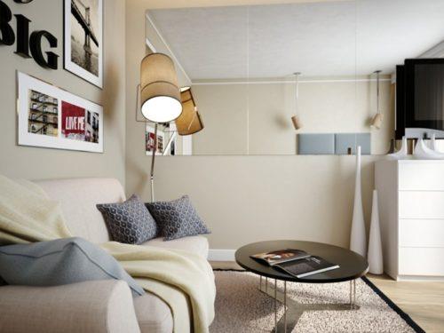 μικρό διαμέρισμα-επίπλωση-στρογγυλό-τραπεζάκι-καφέ-καναπές-τοίχος-καθρέφτης
