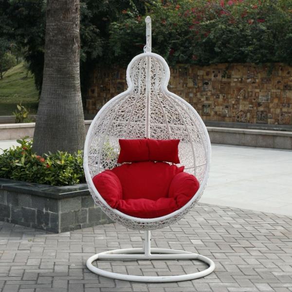 ψάθινη κρεμαστή καρέκλα μπαστούνι κρεμαστή καρέκλα κόκκινα μαξιλάρια