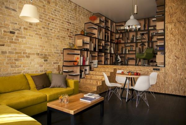 δημιουργικό διαμέρισμα με ρέοντα σχεδιασμό τοίχο από τούβλα και μοριοσανίδες