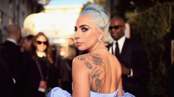 lady gaga back tattoo globes lede