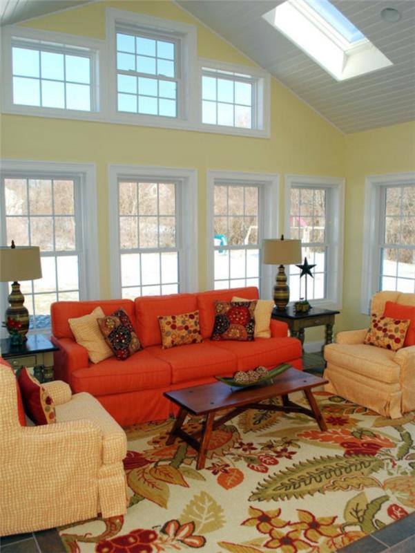 εξοχικό στυλ σαλόνι πορτοκαλί καναπές χρωματιστό χαλί