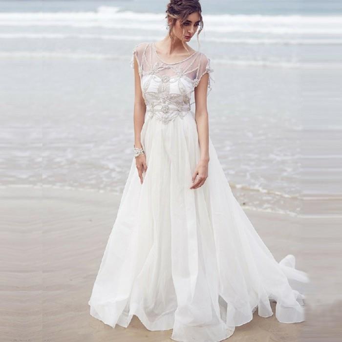 μακρύ boho ύφος νυφικό λευκή νύφη στην παραλία