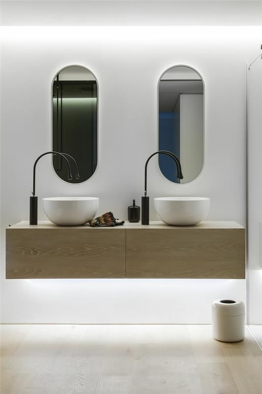 πολυτελείς νιπτήρες σε σχήμα μπολ μπάνιου και οβάλ καθρέφτες τοίχου