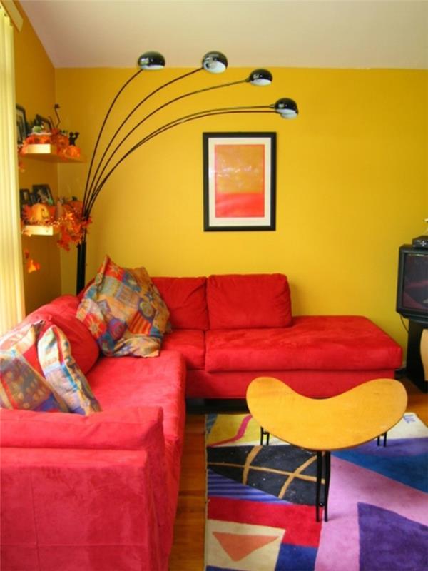 έπιπλα πολύχρωμες ιδέες καθιστικού σαλόνι κόκκινος καναπές κίτρινο χρώμα τοίχου