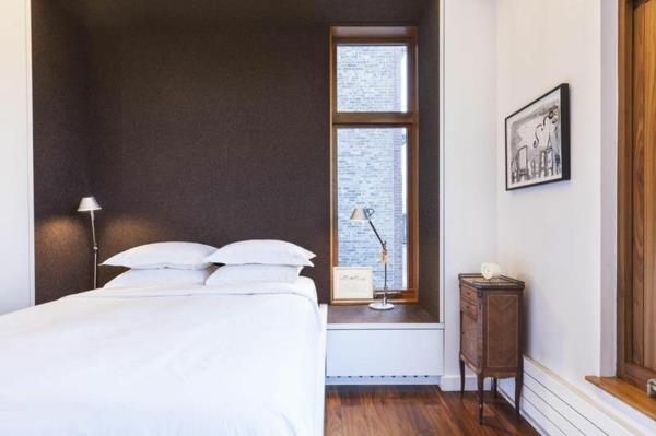 μοντέρνο διαμέρισμα στο SoHo υπνοδωμάτιο με μαύρο τοίχο στο κρεβάτι κλασικό