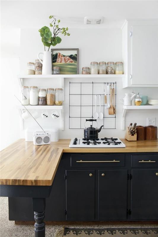 μοντέρνες κουζίνες μαύρα ντουλάπια κουζίνας ξύλινη επιφάνεια εργασίας