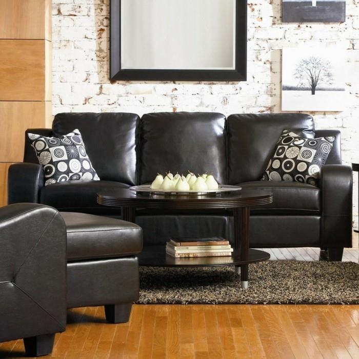 μοντέρνοι καναπέδες μαύρος δερμάτινος καναπές μπεζ χαλί ρίξτε μαξιλάρια διακοσμητικές ιδέες