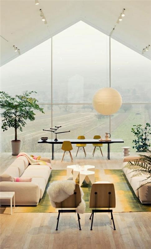 μοντέρνες ιδέες διαβίωσης μεγάλο δωμάτιο με κλίση οροφής κρεμαστό φως