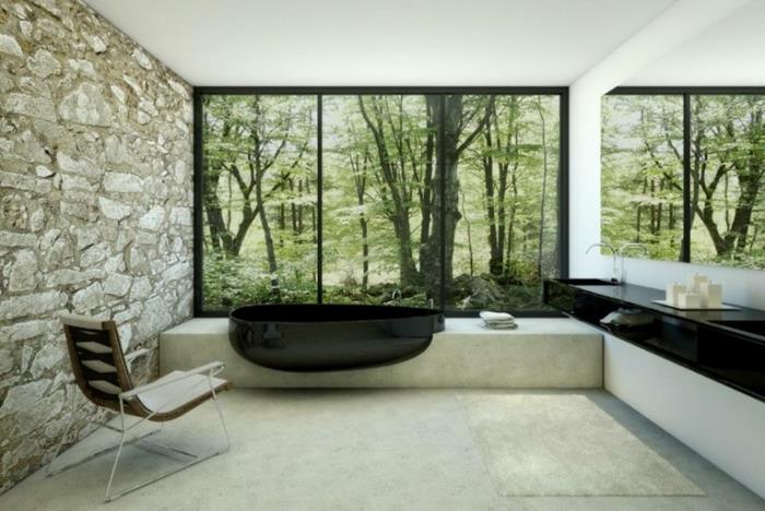 μοντέρνο μπάνιο μπανιέρα μαύρος οβάλ πέτρινος τοίχος