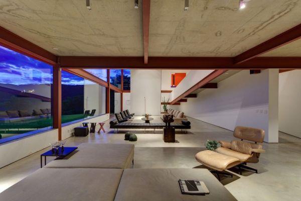 μοντέρνα βραζιλιάνικη πρόσοψη σπιτιού στο ισόγειο χαλαρώστε ξαπλώστρα