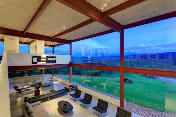 μοντέρνο βραζιλιάνικο σπίτι πρόσοψη μεγάλα παράθυρα σαλόνι