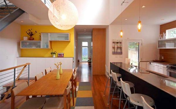 μοντέρνα τραπεζαρία ξύλινο τραπέζι κουζίνα τοίχο νησί χρώμα κίτρινο