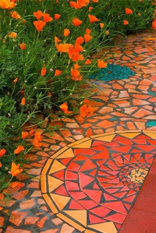 μωσαϊκό μονοπάτι σχεδιασμός κήπου ζεστά πορτοκαλί χρώματα λουλούδια