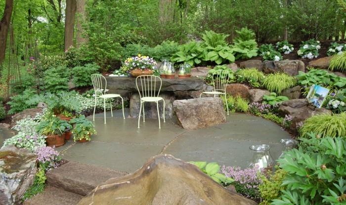φυσικές πέτρες σχεδιασμός κήπου έπιπλα κήπου πέτρινο τραπέζι τραπεζαρία καρέκλες τοπίο κήπου