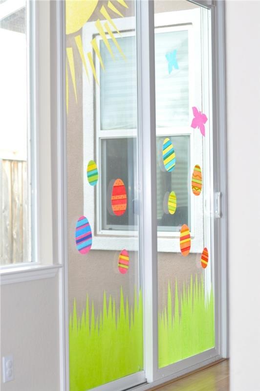 Πασχαλινή διακόσμηση παράθυρα γυάλινες πόρτες διακοσμούν χρωματιστά πασχαλινά αυγά