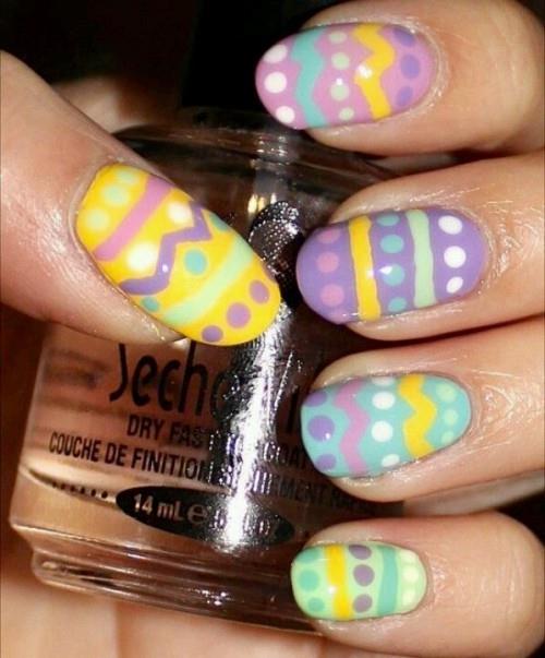 νύχια του Πάσχα μοβ κίτρινες κουκίδες ρίγες