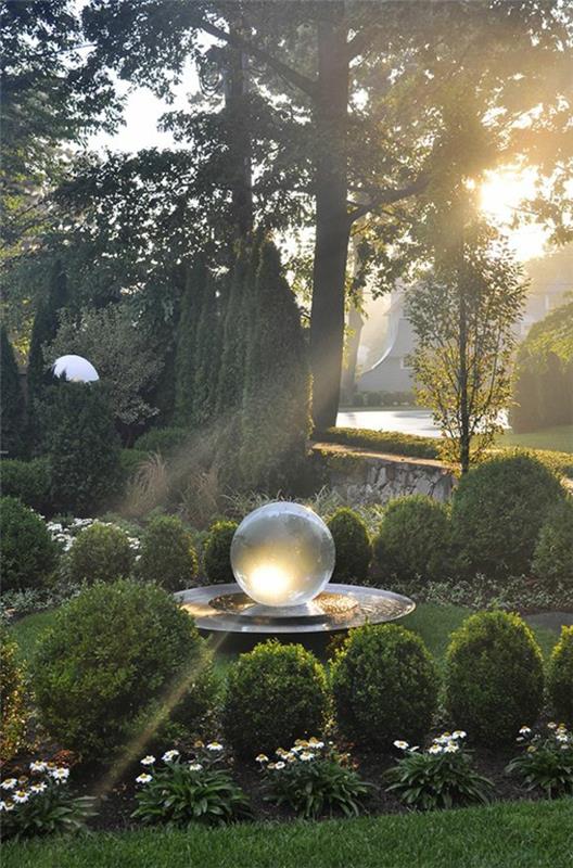 τεράστιες ιδέες διακόσμησης γυάλινης μπάλας σχεδιασμός κήπου αειθαλή φυτά