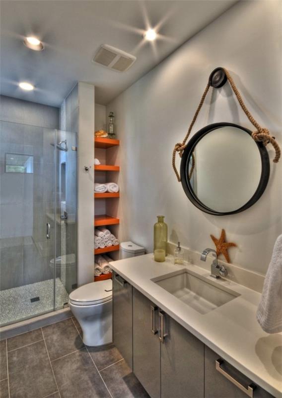 στρογγυλό καθρέφτη μπάνιου Οι ζεστές ιδέες σχεδιασμού μπάνιου συνδυάζουν φυσικά χρώματα